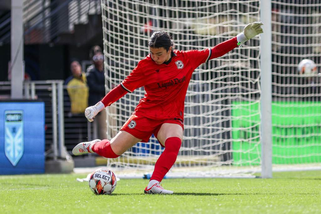 Neeku Purcell clears the ball against DC Power FC on March 23, 2025