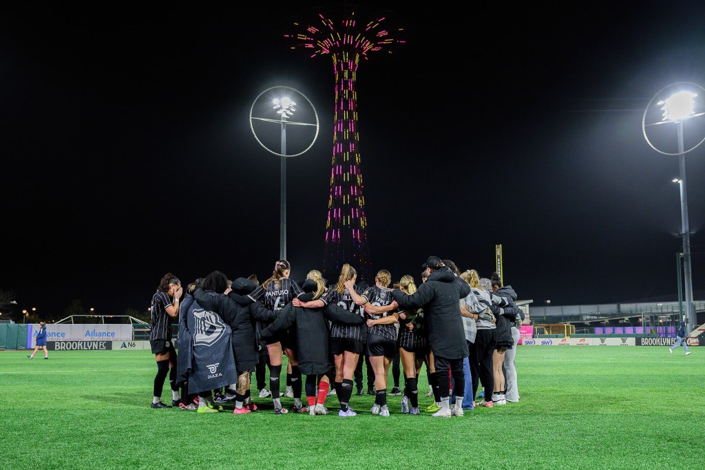 Brooklyn FC women's team huddles at midfield after their match against Tampa Bay on March 29, 2025