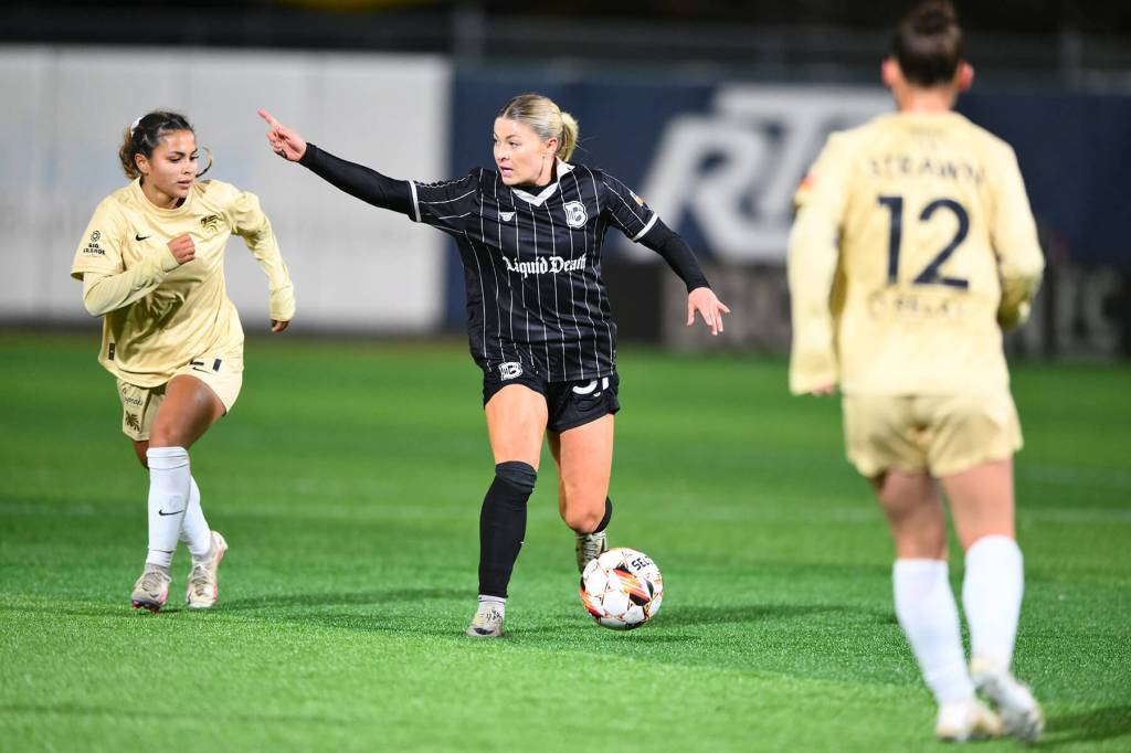 Mackenzie George directs traffic against Dallas Trinity FC on March 19, 2025