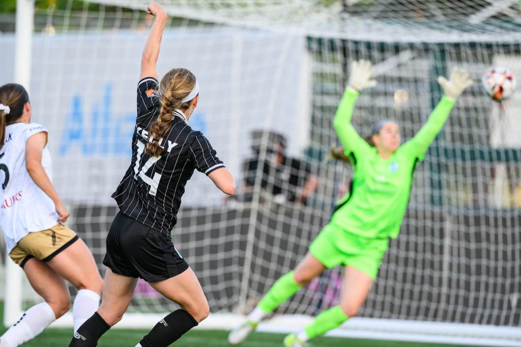 Caroline Kelly slips one past the goalie during Brooklyn FC's match against Spokane Zephyr on May 10, 2025