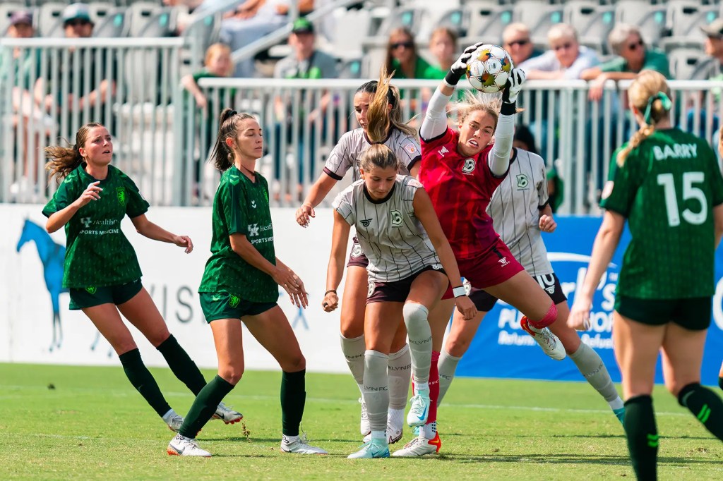 Bre Norris grabs the save among a cluster of players against Lexington Sporting Club on September 7, 2025.
