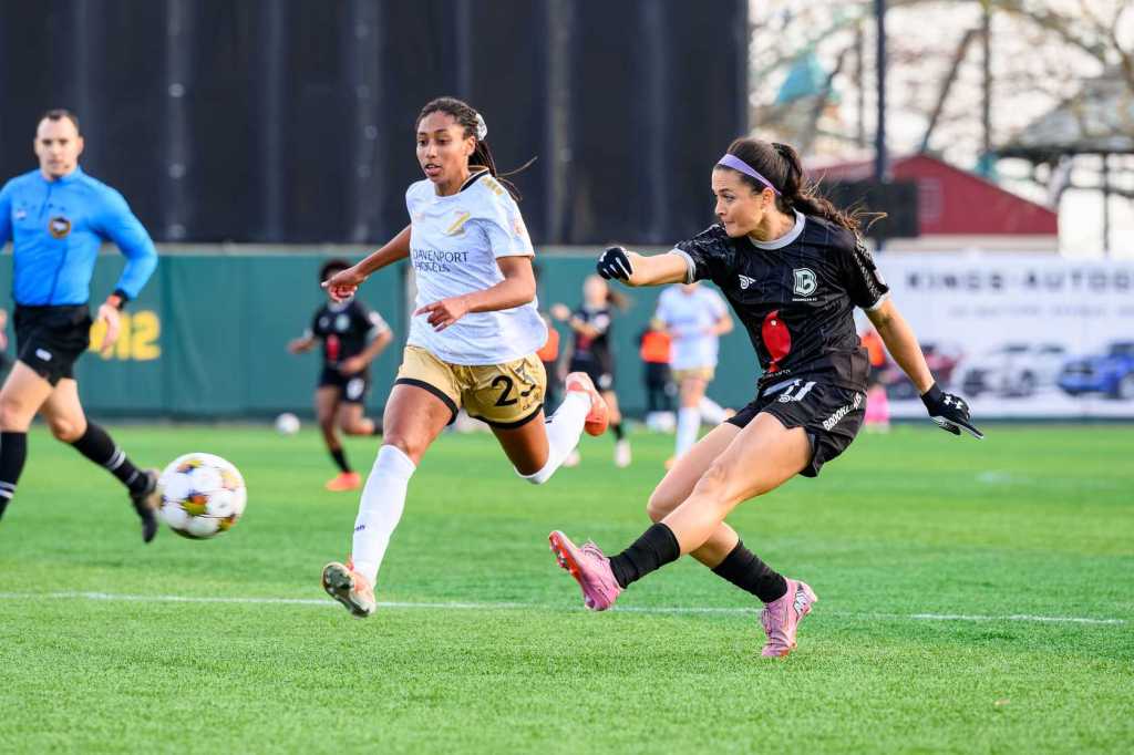 Brooklyn FC forward Sofia Lewis celebrates after scoring with a left-footed shot from the left side of the box into the top left corner against Spokane Zephyr, giving Brooklyn a 1–0 lead.
