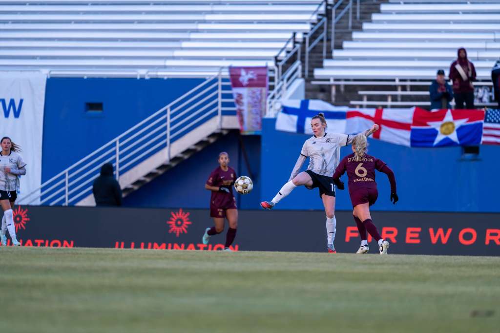 Brooklyn FC forward Rebecca Cooke controls the ball during a match against Dallas Trinity FC