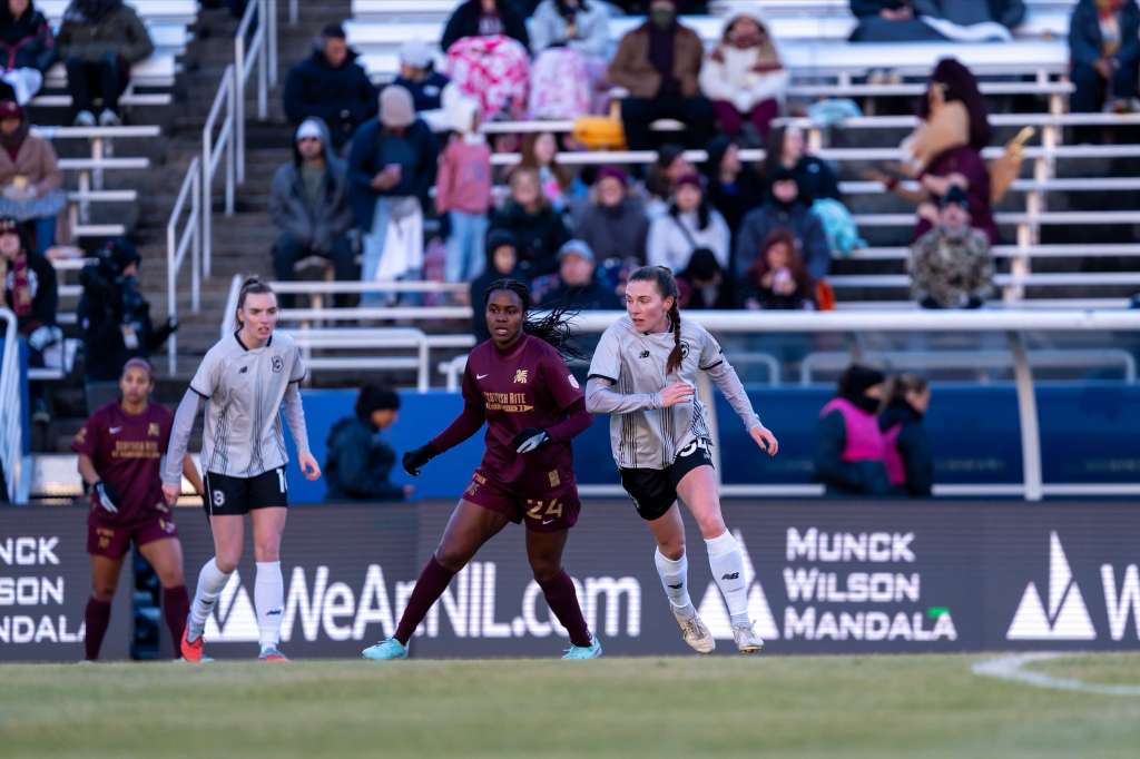 Brooklyn FC forwards Rebecca Cooke and Catherine Zimmerman move into attacking space against Dallas Trinity FC