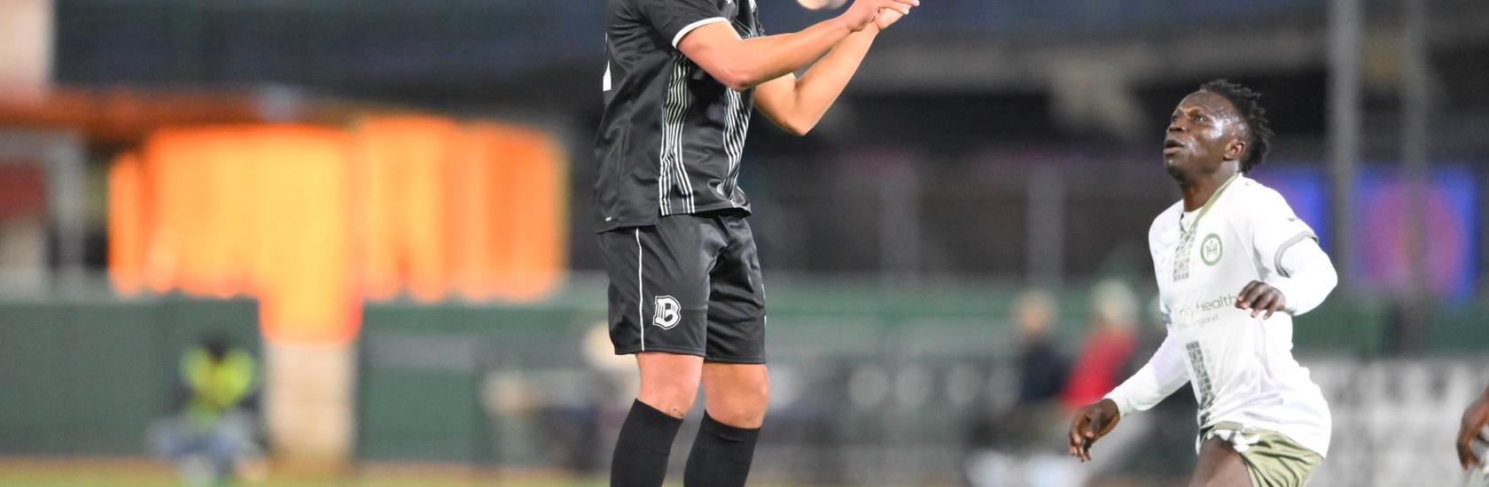Brooklyn FC defender Thomas Vancaeyezeele jumps to head the ball during a match against Hartford Athletic at Maimonides Park.