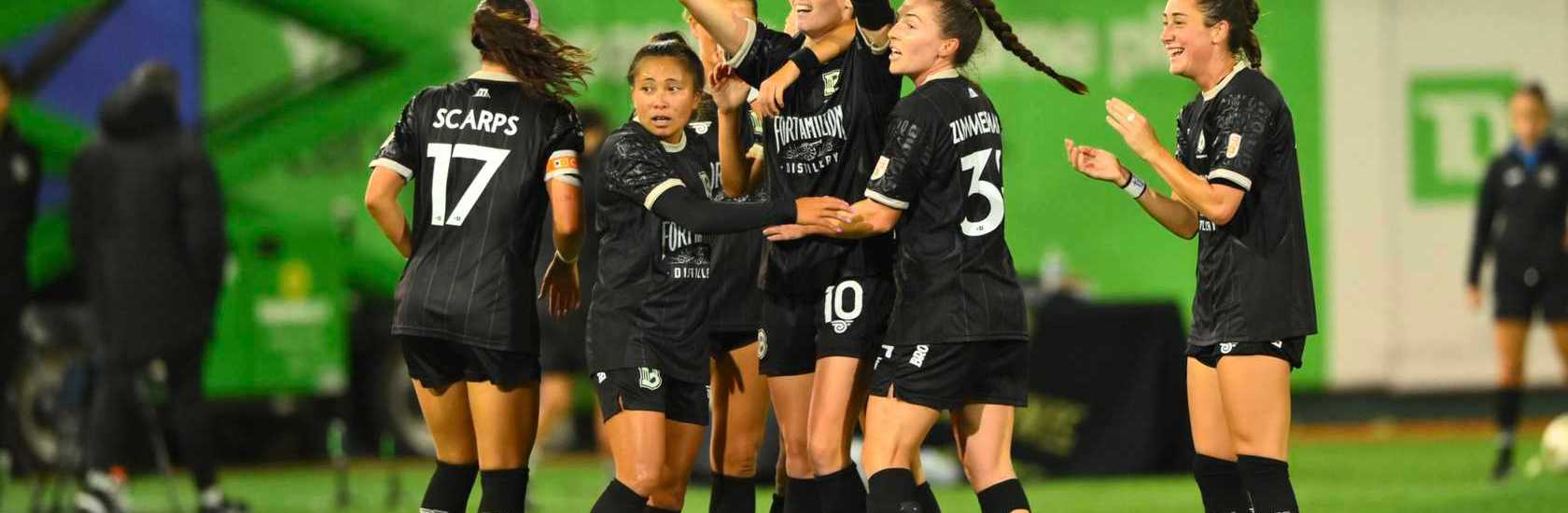 Brooklyn FC women players celebrate together during a match at Maimonides Park