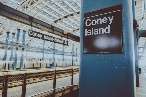 Coney island subway stop during the summer